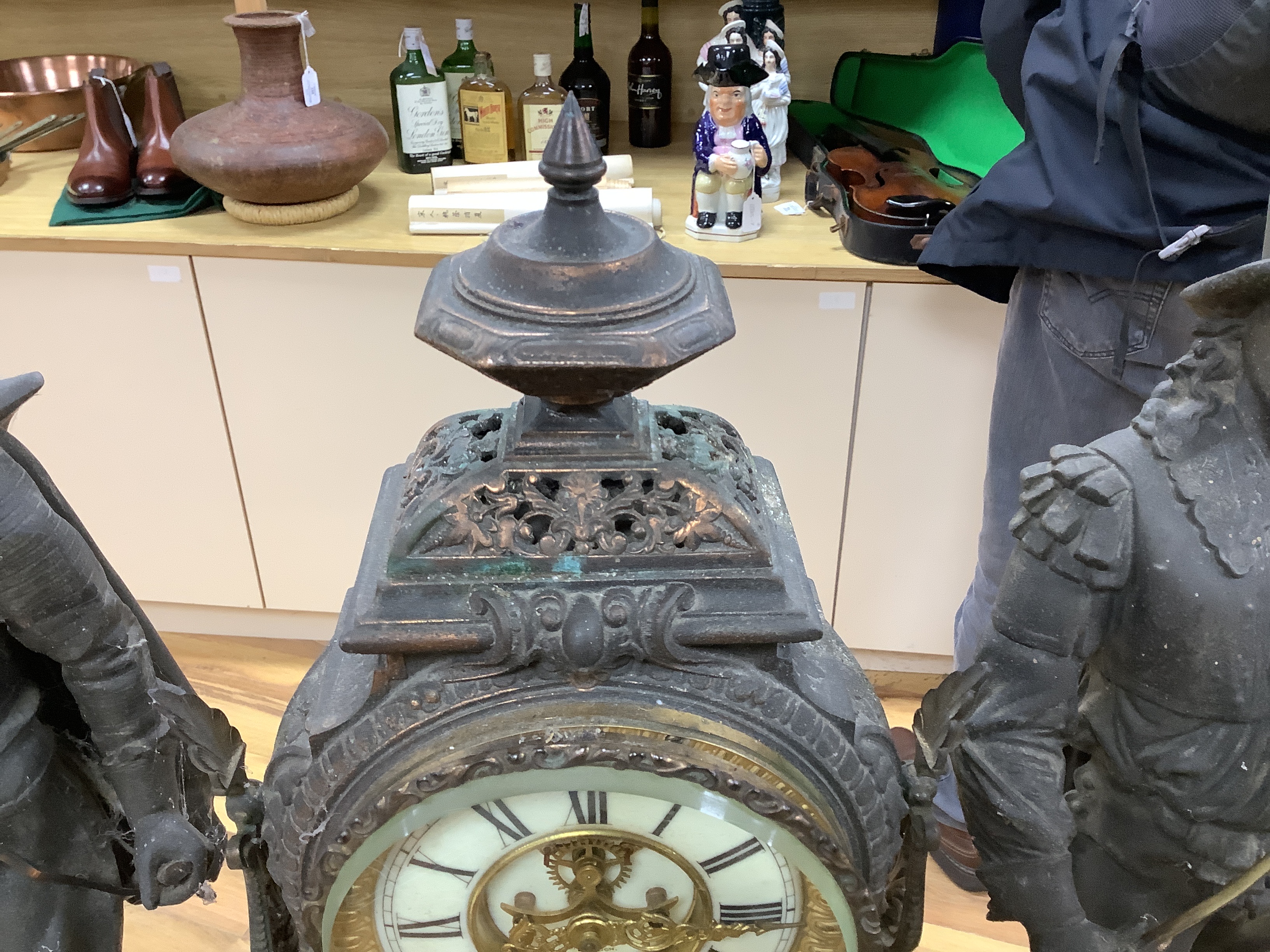A 20th century American spelter and Cavalier figural mantel clock, 52cm high